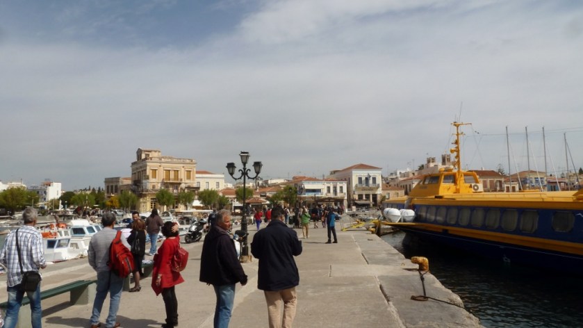 Walking into town, along the dock,  in Aegina, Greece