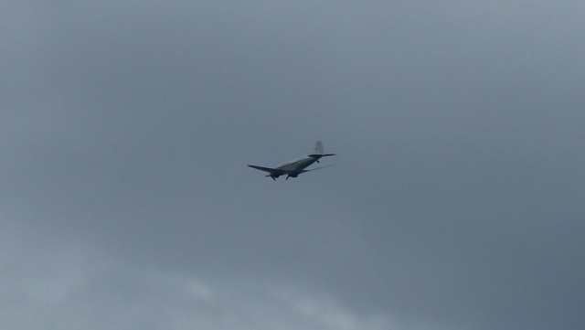 Old aircraft flies overhead. Rog thought it might be a C-46.