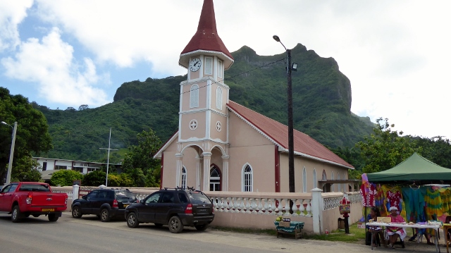 Passing the church flanked by vendors.
