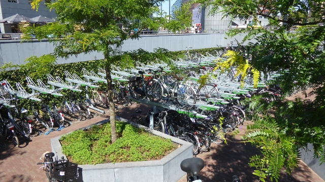 A multi-tiered parking garage for bicycles.