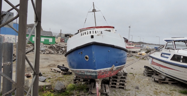 As we strolled back to the tender dock, we spotted this quaint little old boat.