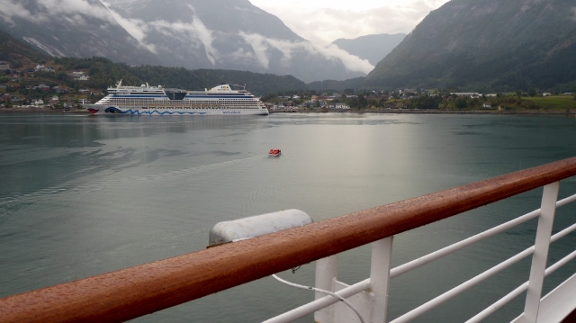 Anchored in the Hardanger Fjord. The first tender is going to the dock.