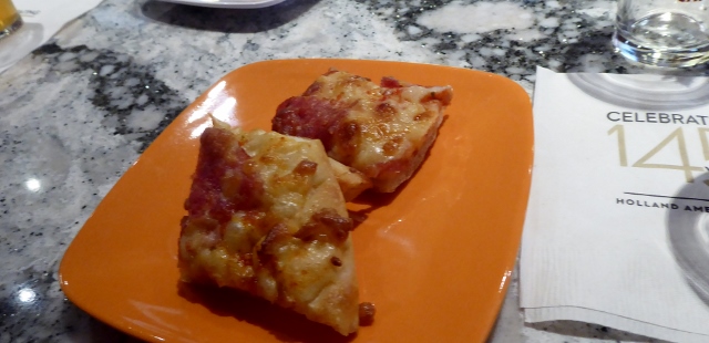 The tasting accompaniments were pizza and nuts.