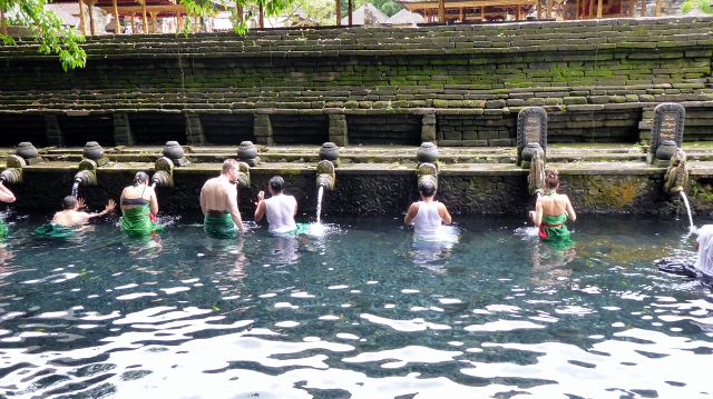 The pool is used for ritual purification before entering the prayer garden.