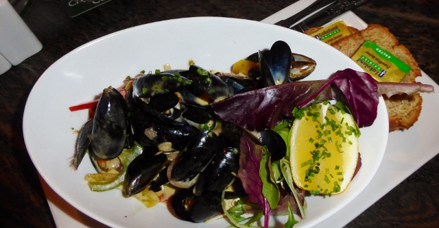 Sandy had mussels in a white wine sauce.