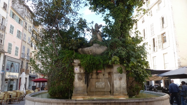 The fountain at Le Chantilly Cafe provides a charming view and serene sound.